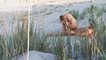 Big boobs amateur voyeur sucking dick at the beach